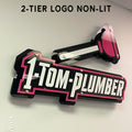 1-Tom-Plumber 2-Tier Acrylic Logo